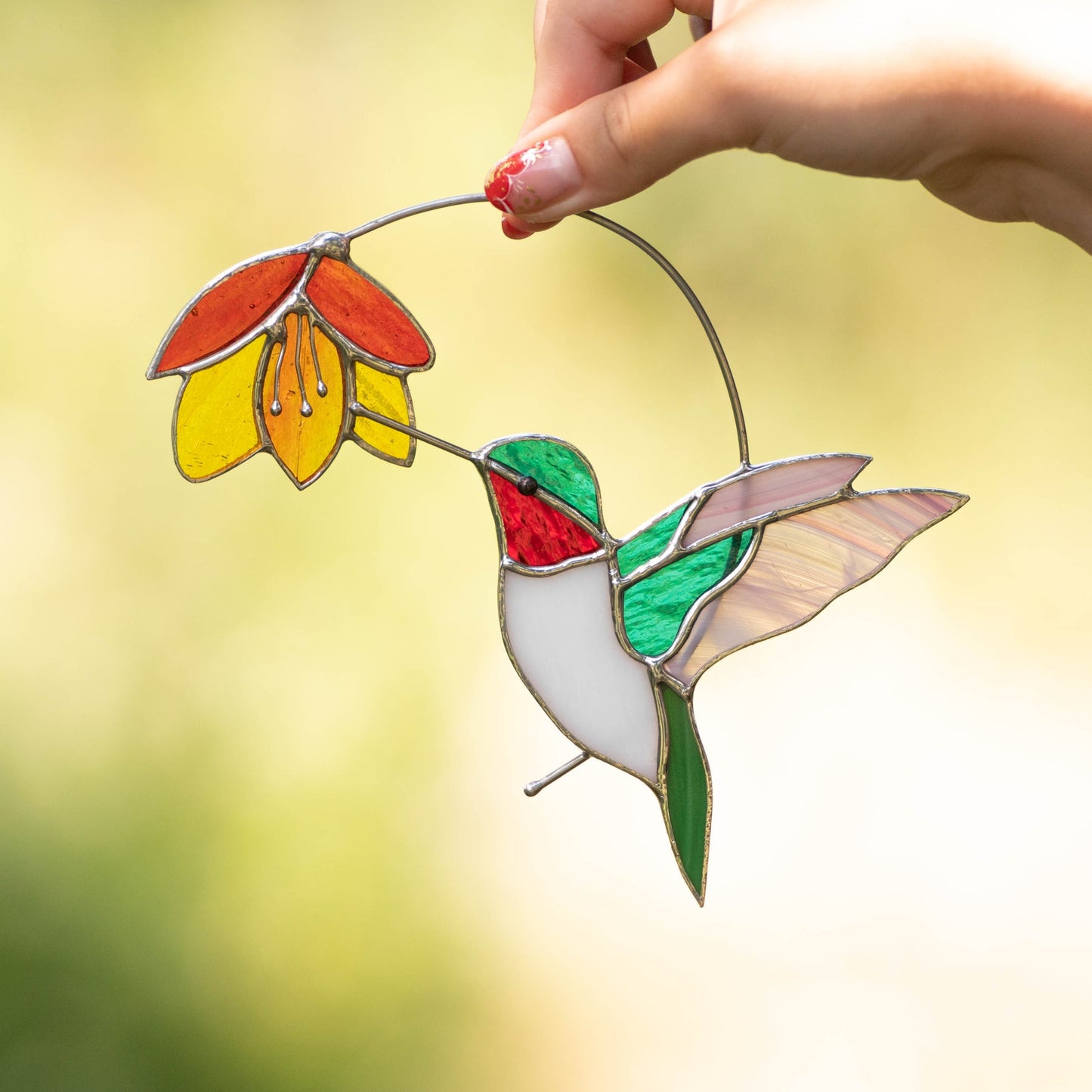 COLOURFUL HUMMINGBIRD WITH FLOWER