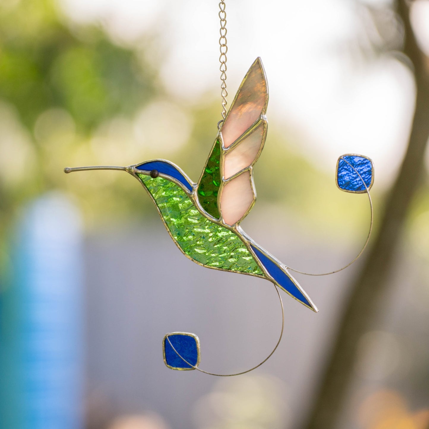 SUSPENSION DE COlibris À QUEUE DE RAQUETTE