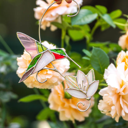 RUBY-THROATED HUMMINGBIRD WITH THE FLOWER