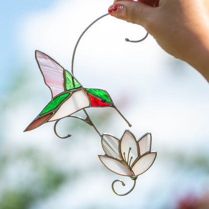 RUBY-THROATED HUMMINGBIRD WITH THE FLOWER