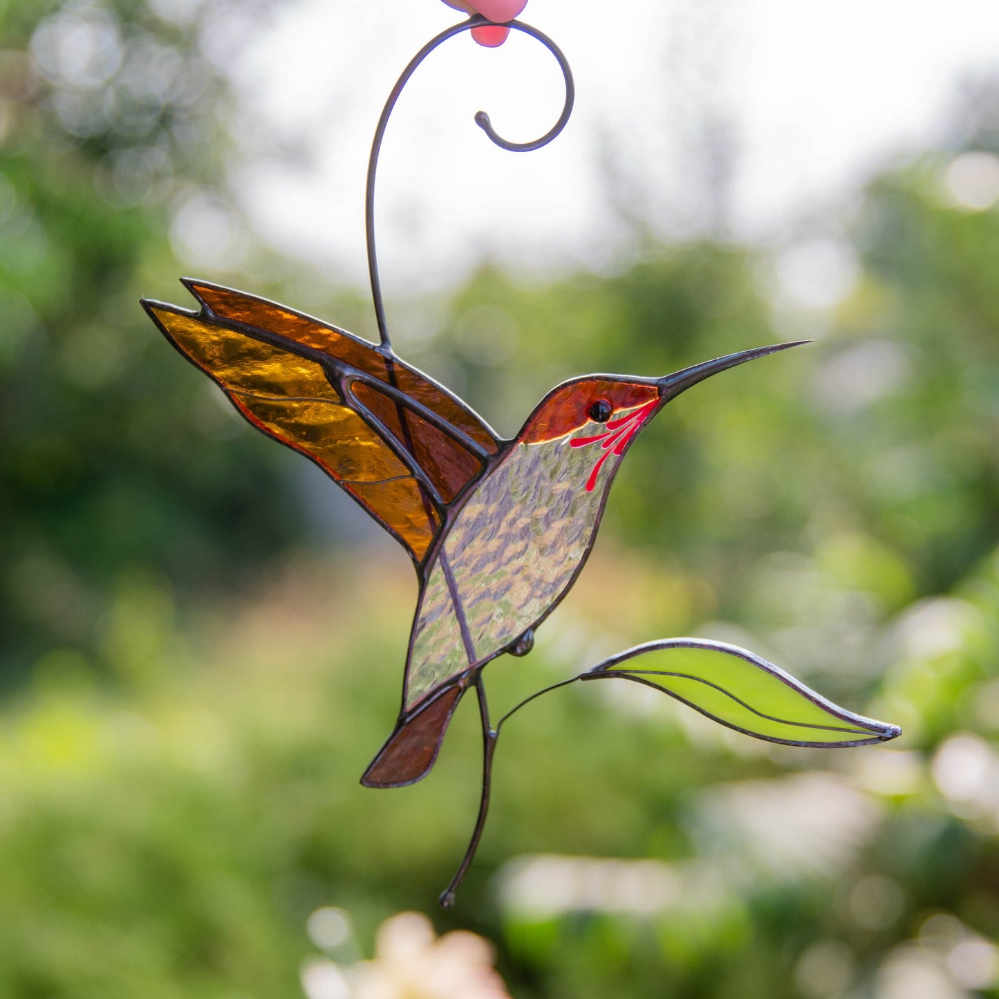 Sonnenfänger-Buntglas „Fliegender goldener Kolibri“