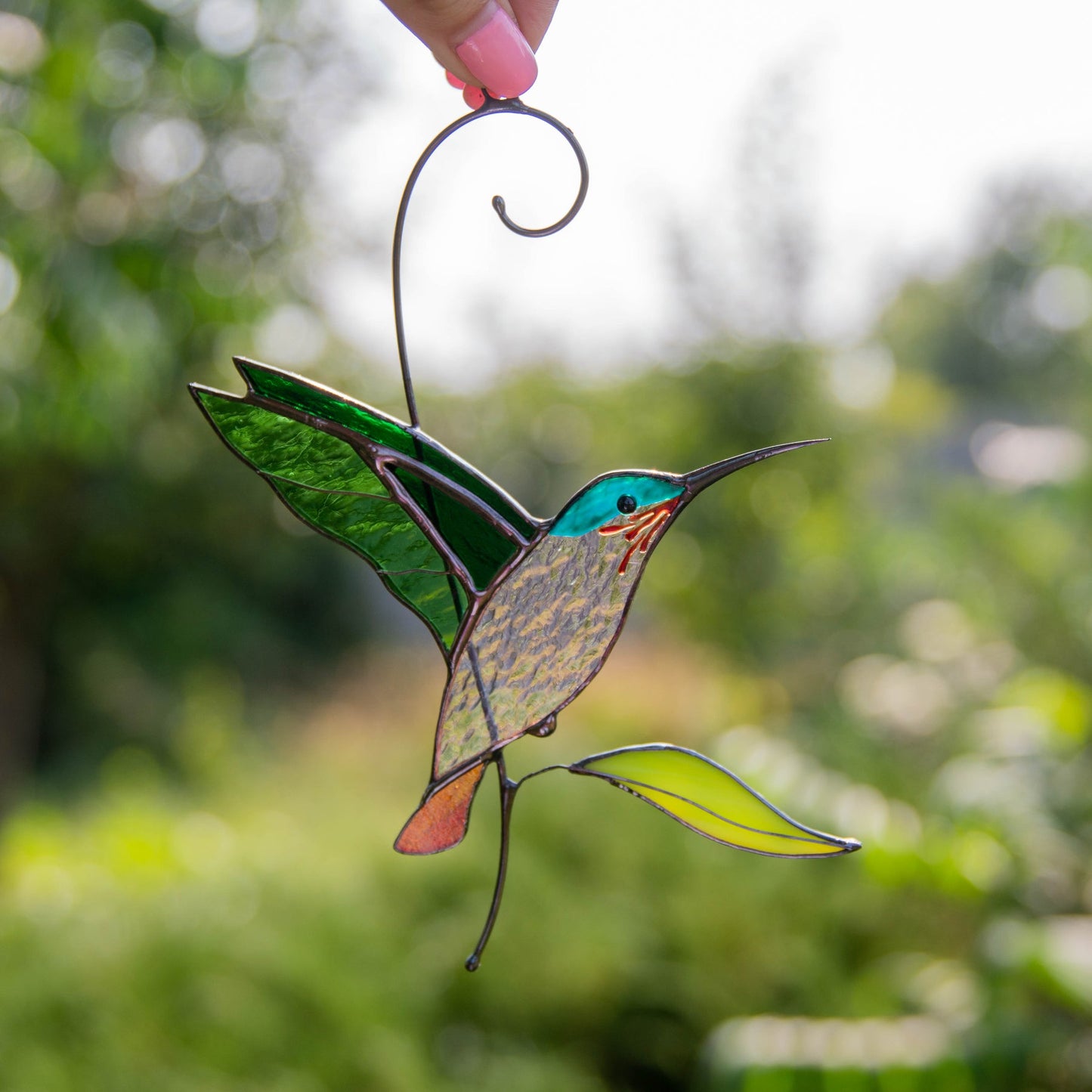 FLIEGENDE GRÜNE KOLIBRI-SONNENFÄNGER