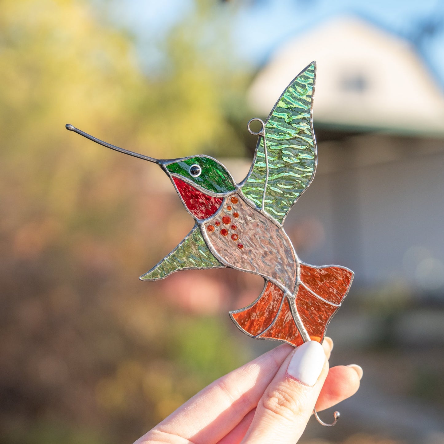 Sonnenfänger aus Buntglas „glänzender Kolibri“