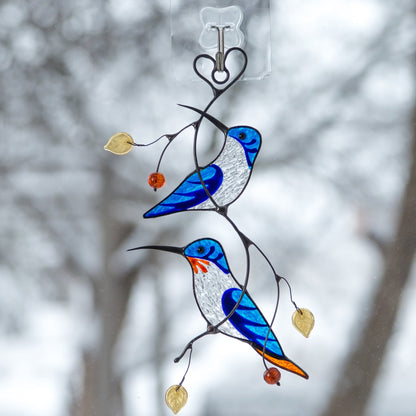 BLUE HUMMINGBIRDS ON THE BRANCH