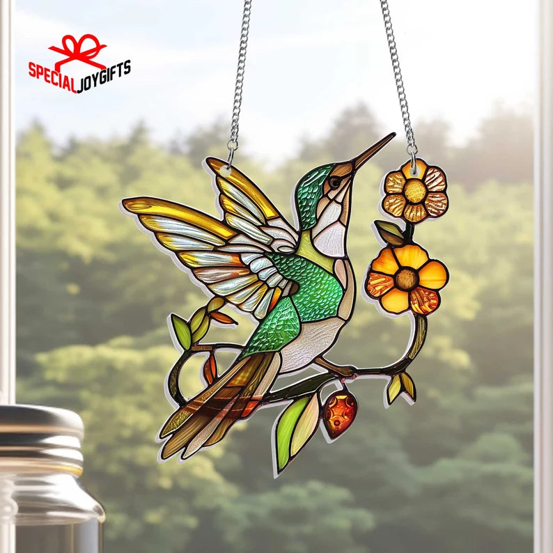 Upgrade your home decor with this stunning Hummingbird Acrylic Window hanging. Perfect for Lilac lovers, bird nerds, and anyone who appreciates beautiful home decor.