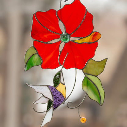 VOLANT VERS LA FLEUR ROUGE COlibris PHOTO D'OISEAU