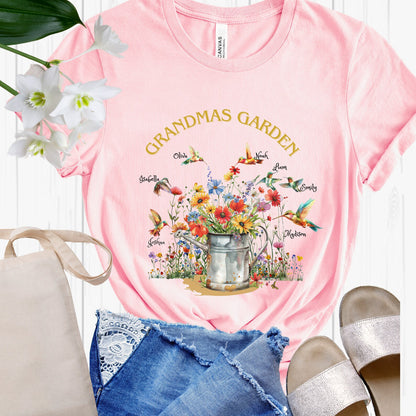 Grandmas Humming Birds Garden T-shirt Custom Grandkid Names Flower Filled Water Can Grandma T-Shirt Personalized Shirt Womens Shirt Trending